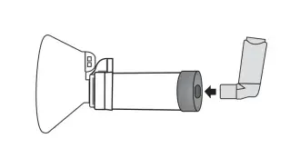 diagram depicting inhaler being inserted into aerochamber plus flow-vu device with mask