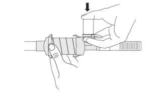 diagram depicting how to hold aerochamber vent holding chamber to administer medication