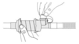 diagram depicting how to remove mdi canister from aerochamber vent holding chamber