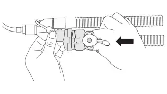 diagram depicting how to latch chamber in collapsed position after using aerochamber vent holding chamber