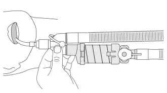 diagram depicting how to remove inspiratory limb from the wye of aerochamber vent holding chamber