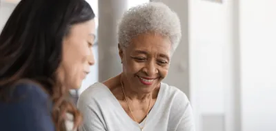 Elderly woman looks happy